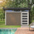 Modern storage shed with a sliding barn door and clean lines, set against a lush outdoor landscape and poolside view.