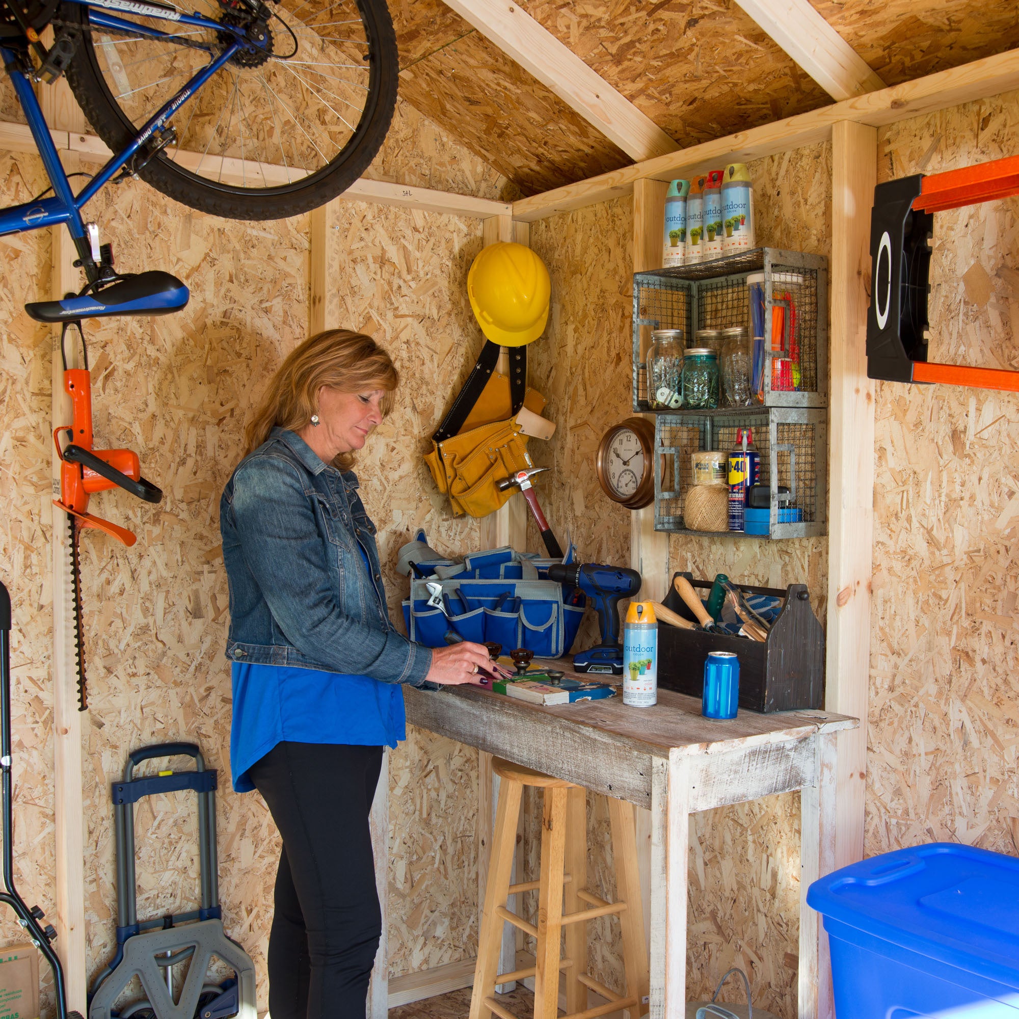 Interior shot of a women working at her workbench 