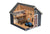 3D cutaway view of a storage shed interior, showing tools, sports equipment, a workbench, and a riding mower.